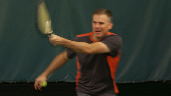 Dr. Hauser playing tennis
